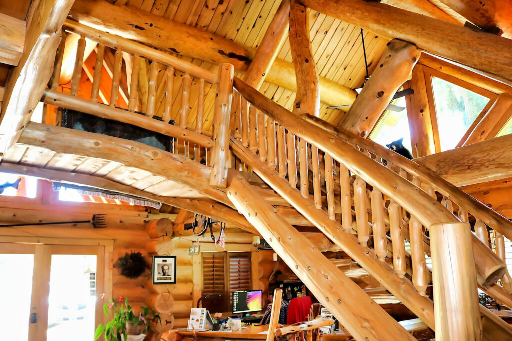 Yellowstone Log Homes beams and staircase located in the McGregor office 4400