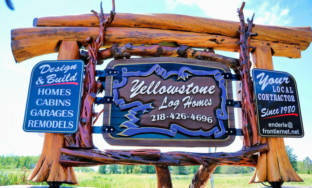 Yellowstone Log Homes custom and Log Lake home builder sign 4384