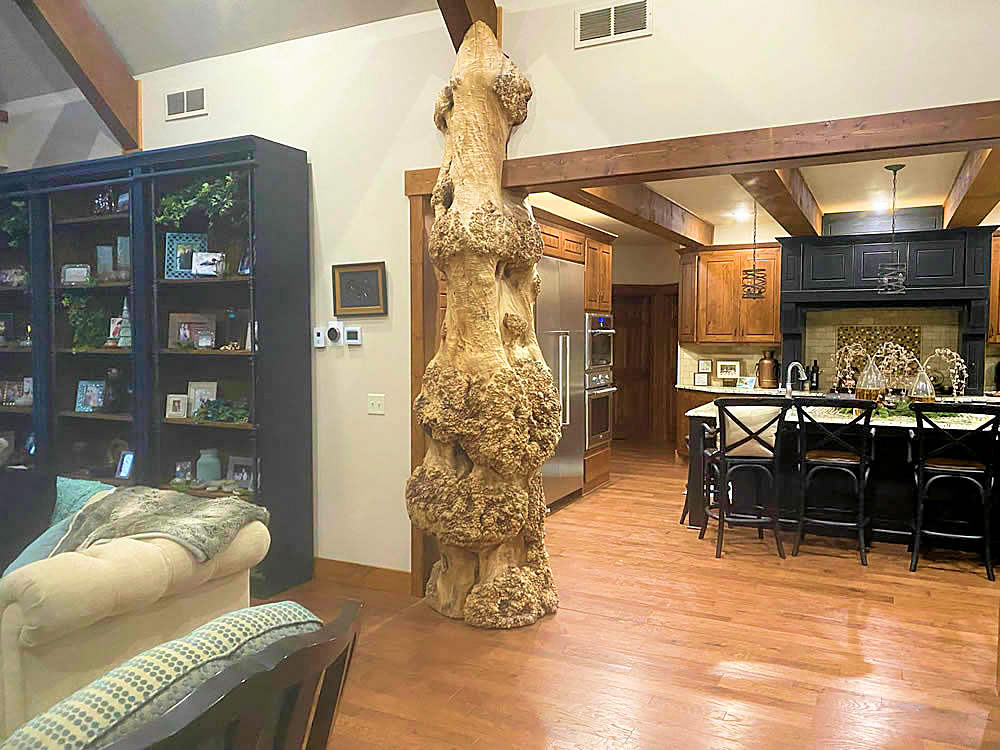 yellowstone-log-homes-interior-design-elements-log-tower-in-living-room-2